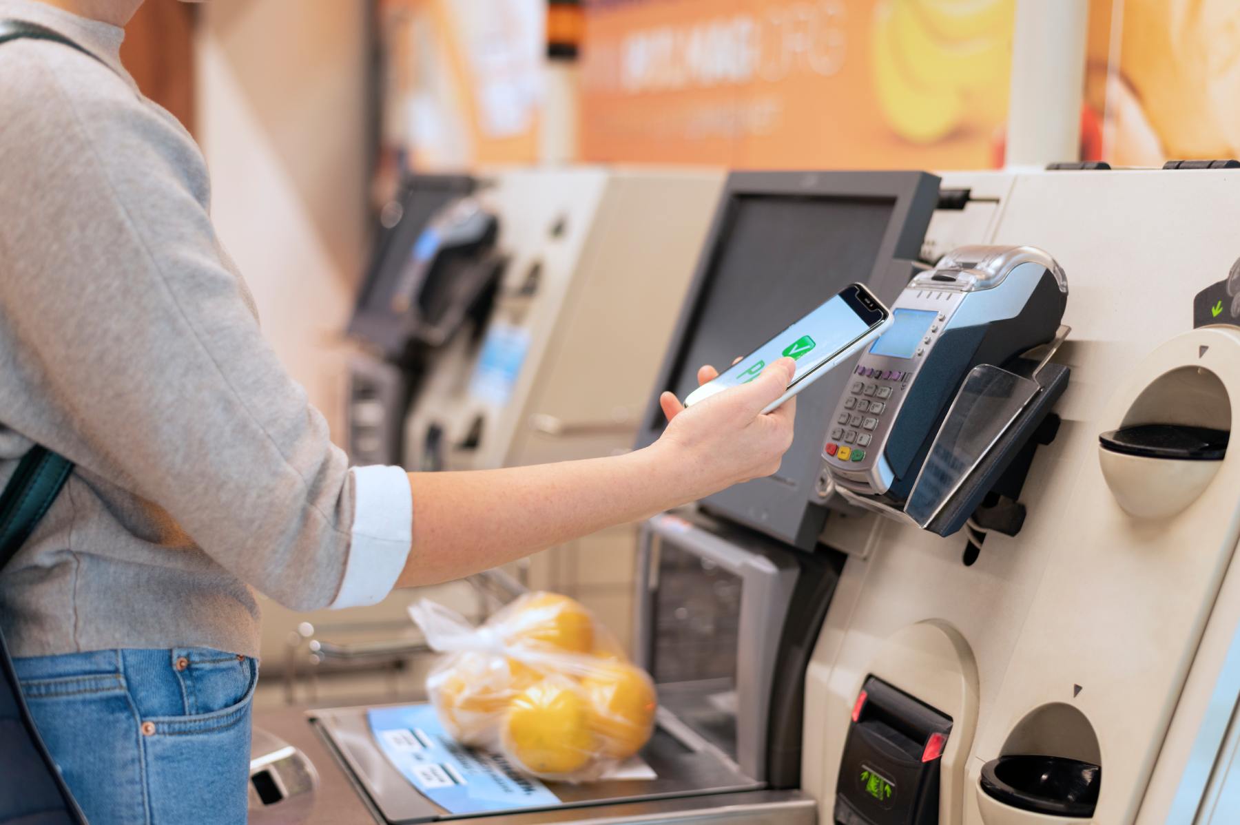 person-paying-with-its-smartphone-wallet-app (1) person-paying-with-its-smartphone-wallet-app (1)