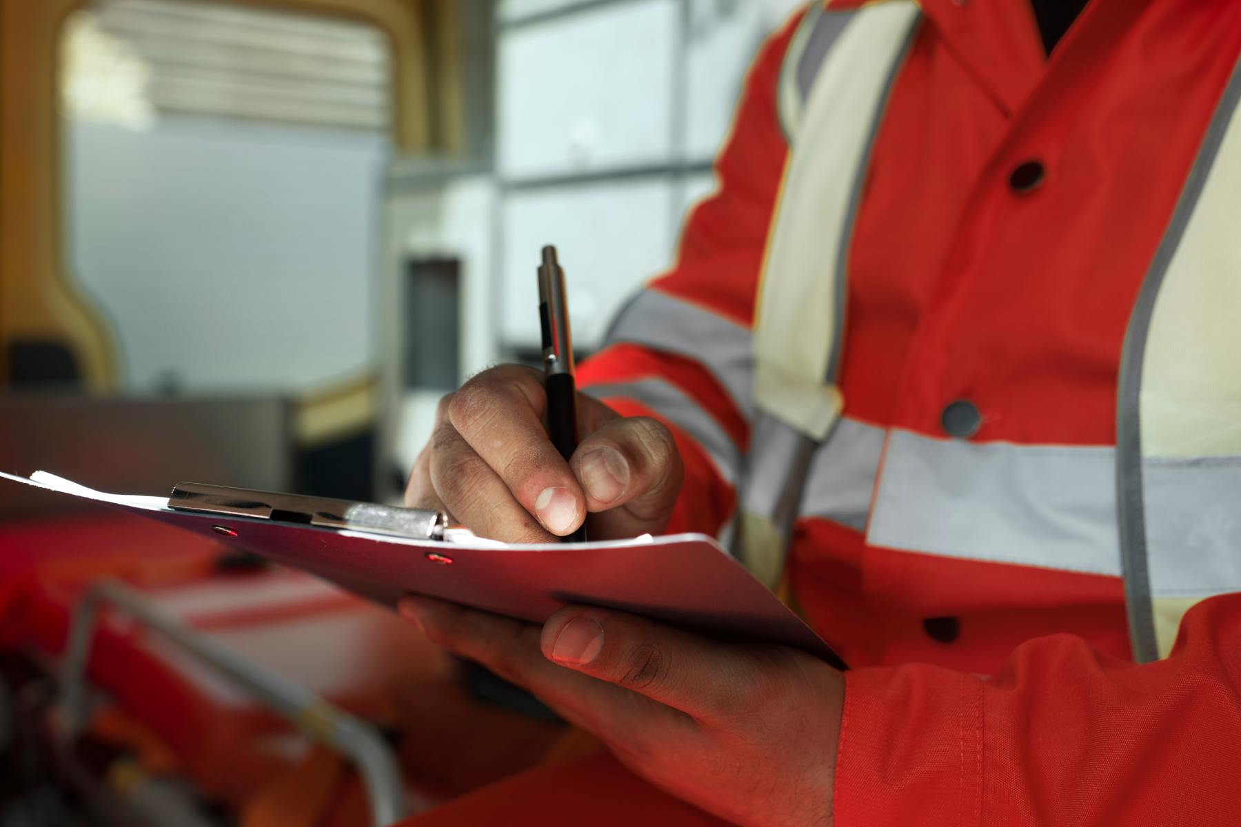 side-view-man-taking-notes-ambulance-car (1) side-view-man-taking-notes-ambulance-car (1)